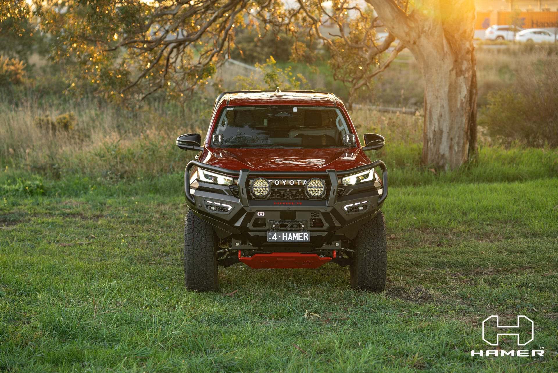 Toyota Hilux with West Coast Off Road Atlas Series Plus bull bar in natural setting.