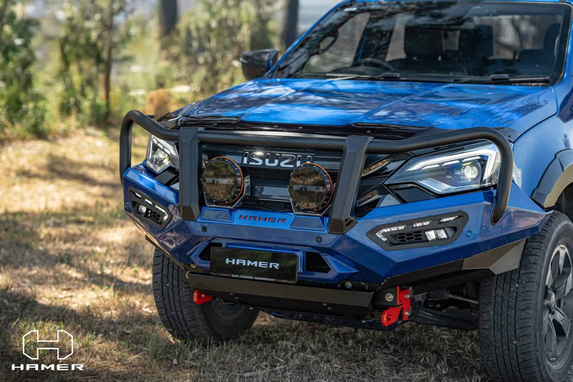 Blue Isuzu D-Max with West Coast Off Road bull bar and accessories.