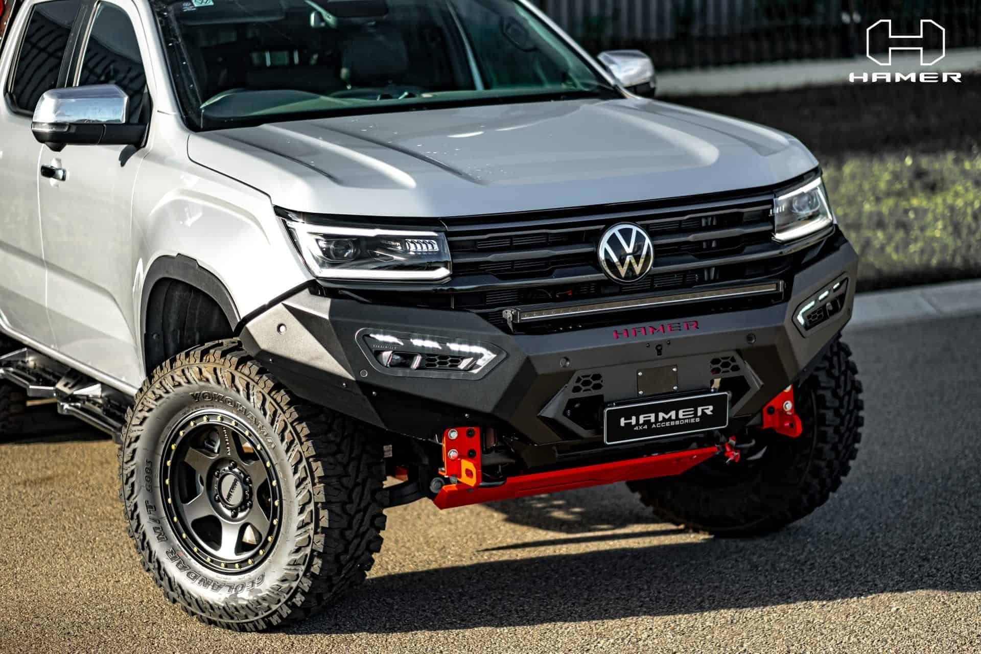 Volkswagen Amarok with West Coast Off Road Atlas bull bar and off-road tires.