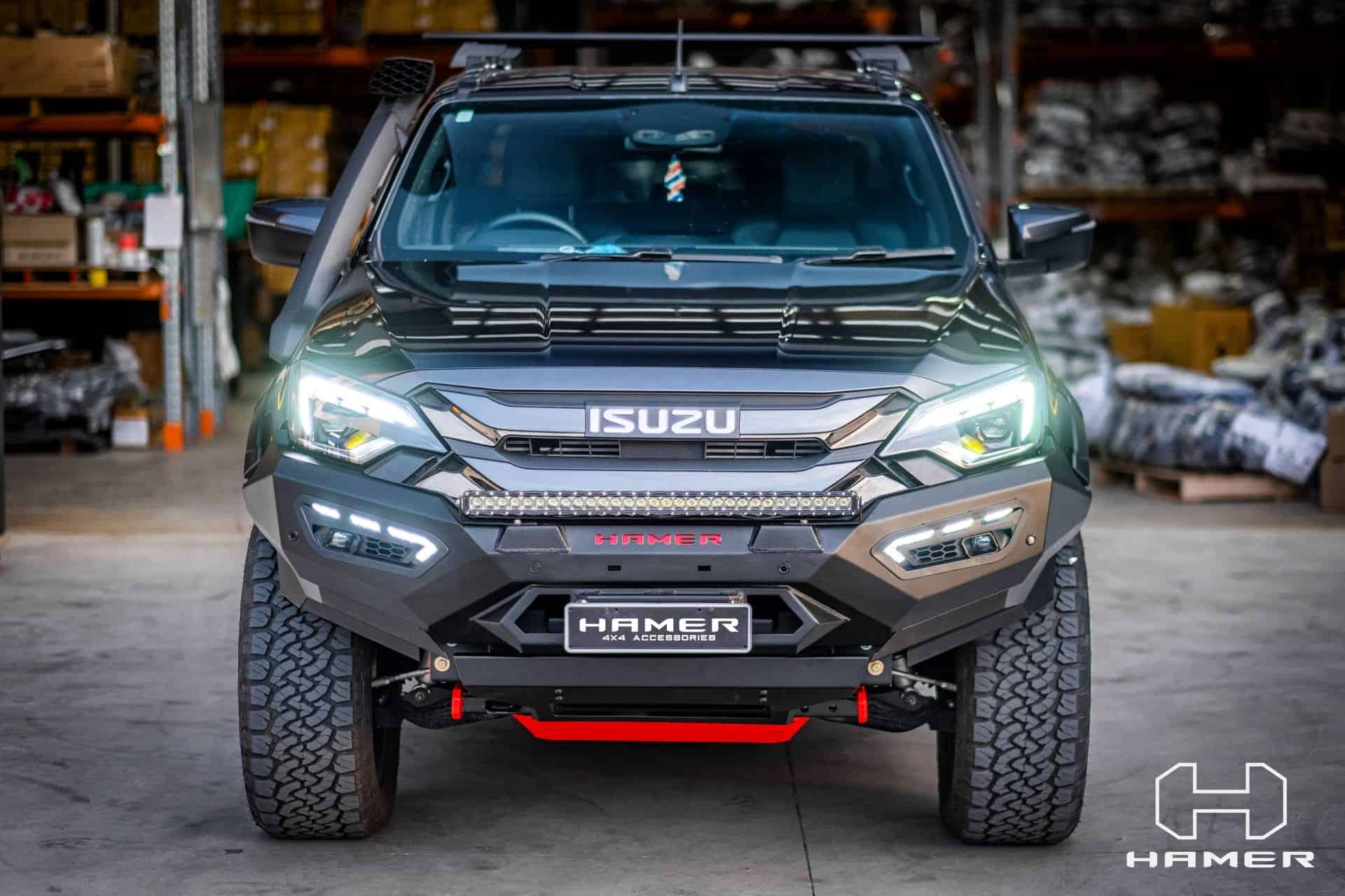 Isuzu D-Max with West Coast Off Road Atlas bull bar in workshop.