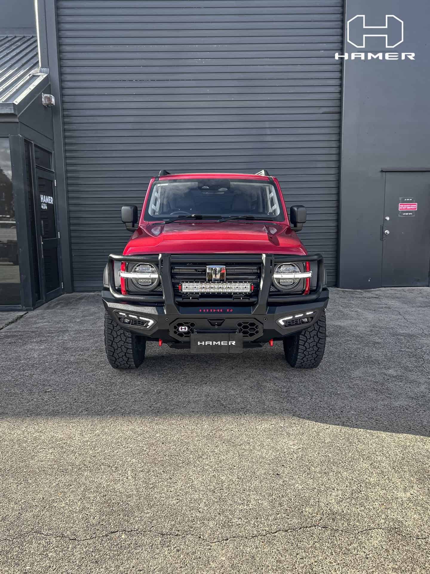 Red GWM Tank 300 with West Coast Off Road Atlas Series Plus bull bar.