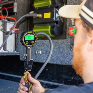 on-board-air-installation-perth-technician-testing-tyre-pressure